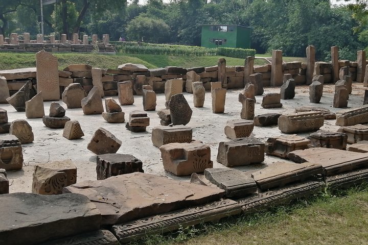 Ancient stone ruins at Sarnath Archaeological Site near Varanasi, showcasing historical Buddhist remains